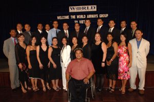 The adoptees gathered for a final group photo after a gala dinner.