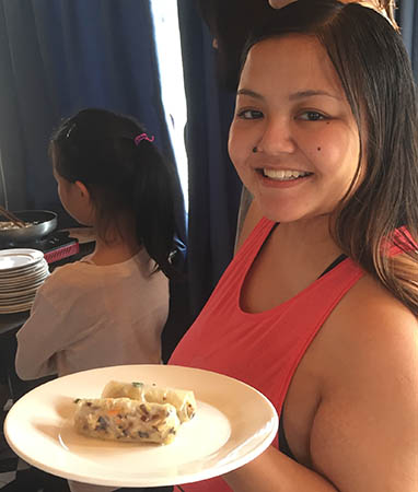 vietnamese adoptee displays summer rolls